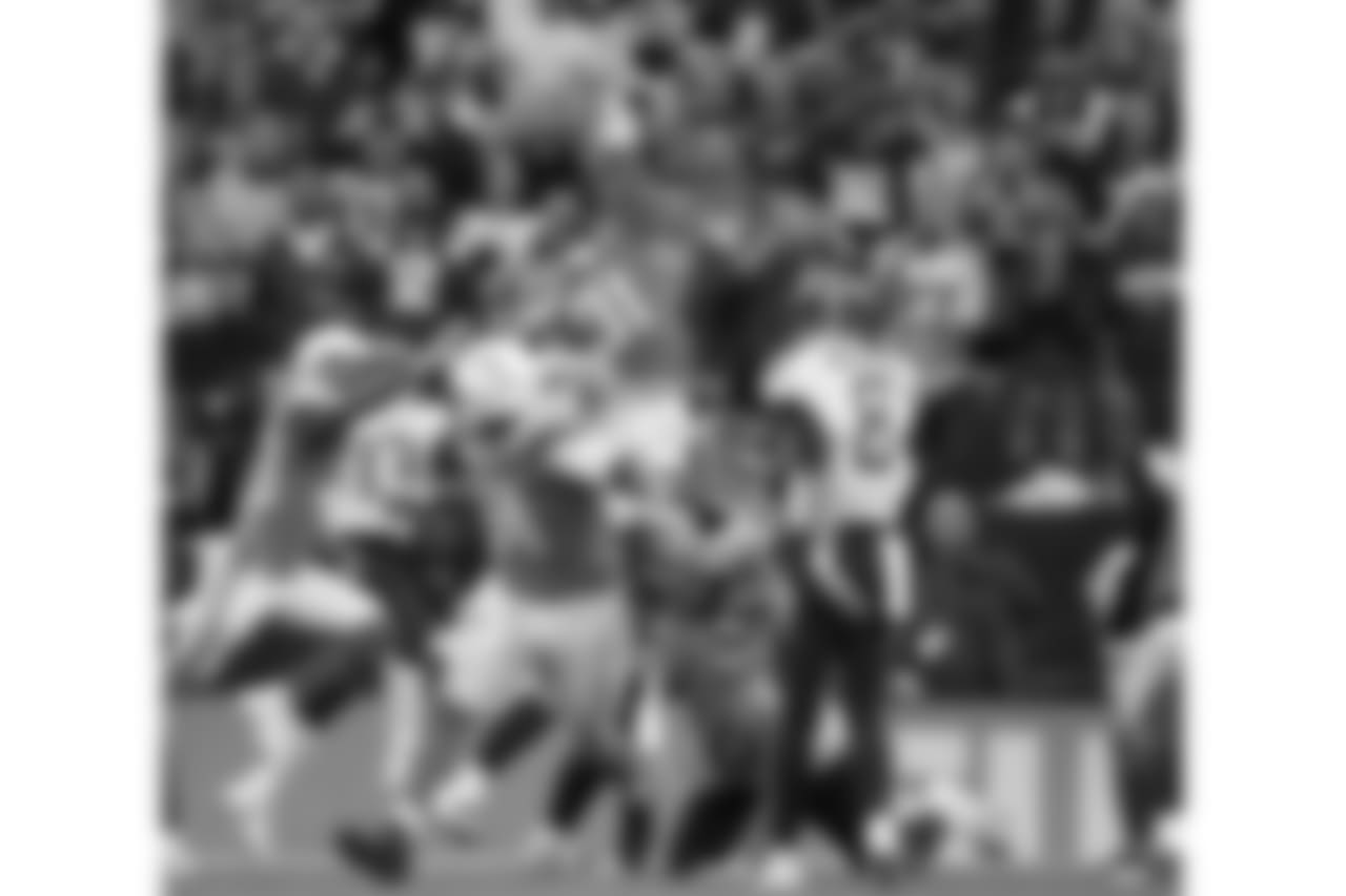 Adrian Phillips tips the ball on a failed 2-point conversion by the Tennessee Titans on Sun. Oct. 21, 2018 at Wembley Stadium in London.