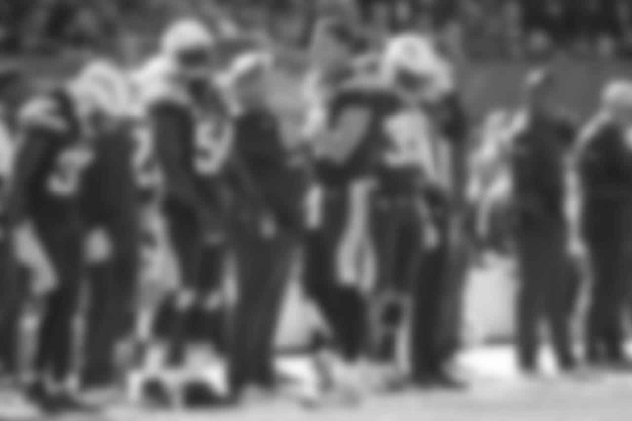 Philip Rivers celebrates from the sidelines as the Bolts lead the Browns 7-0 in the first quarter during the Week 6 matchup.