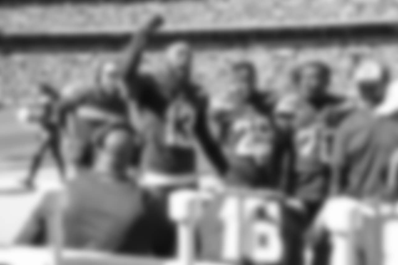 Keenan Allen celebrates Tyrell Williams on the sideline during the Week 6 matchup against the Browns.