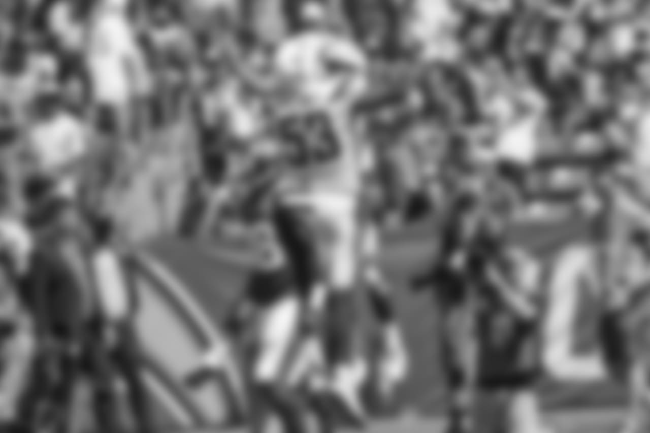 Mike Pouncey and Austin Ekeler celebrate Ekeler's touchdown in the season opener against the Kansas City Chiefs from ROKiT Field at StubHub Center.