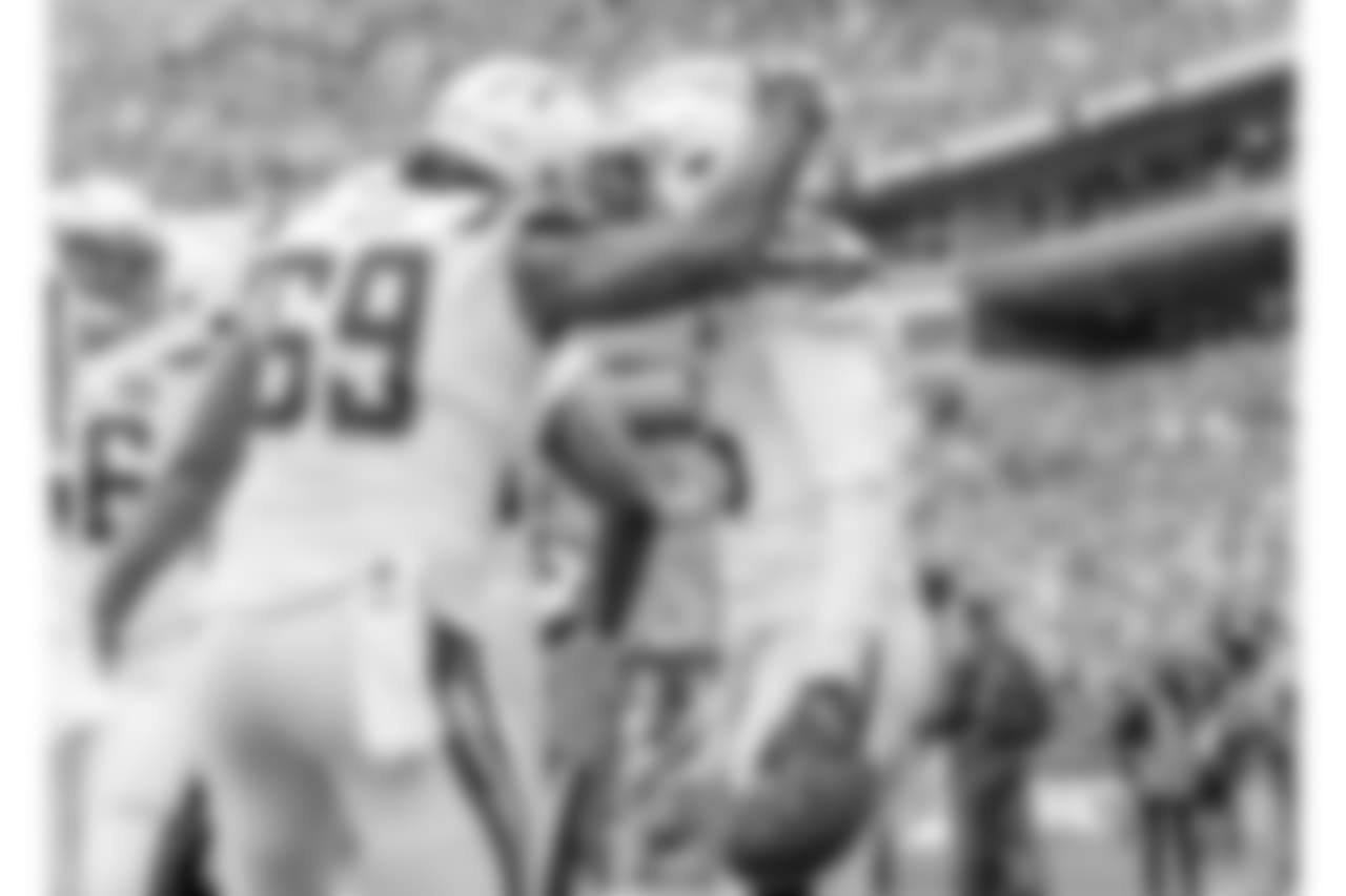 Sam Tevi and Tyrell Williams celebrates Williams' touchdown to get the Chargers on the board during the Week 9 contest against the Seattle Seahawks at CenturyLink Field.