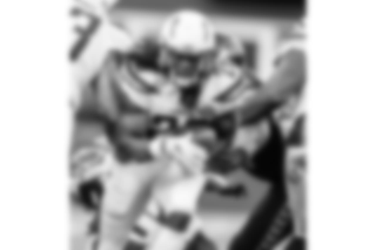 Running back Melvin Gordon breaks through the line vs. the Seattle Seahawks on Sun. Nov. 4, 2018 at CenturyLink Field in Seattle, Washington.
