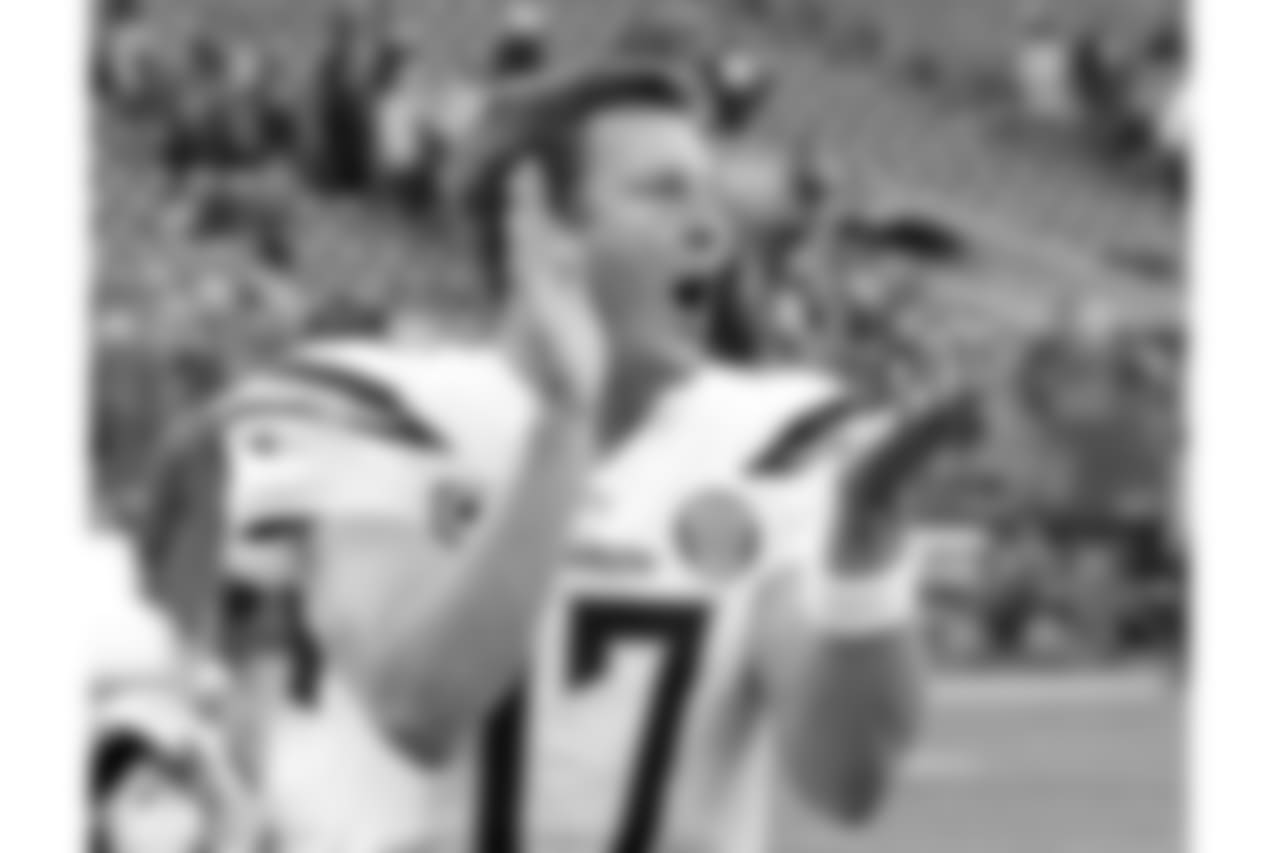 Philip Rivers celebrates as he leaves the field after an NFL football game against the Seattle Seahawks, Sunday, Nov. 4, 2018, in Seattle. (AP Photo/Ted S. Warren)