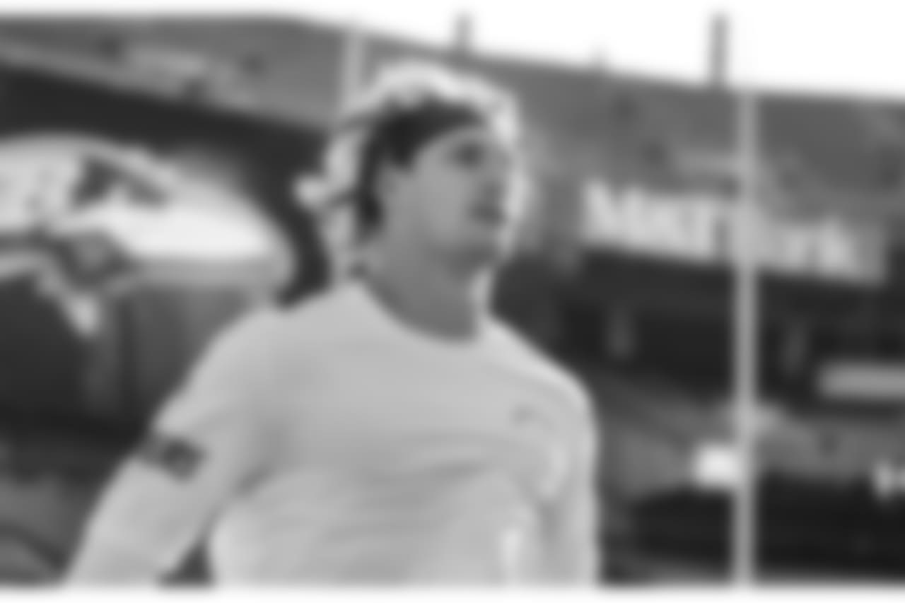 Joey Bosa warms up before the Wild Card matchup against the Baltimore Ravens at M&T Bank Stadium.