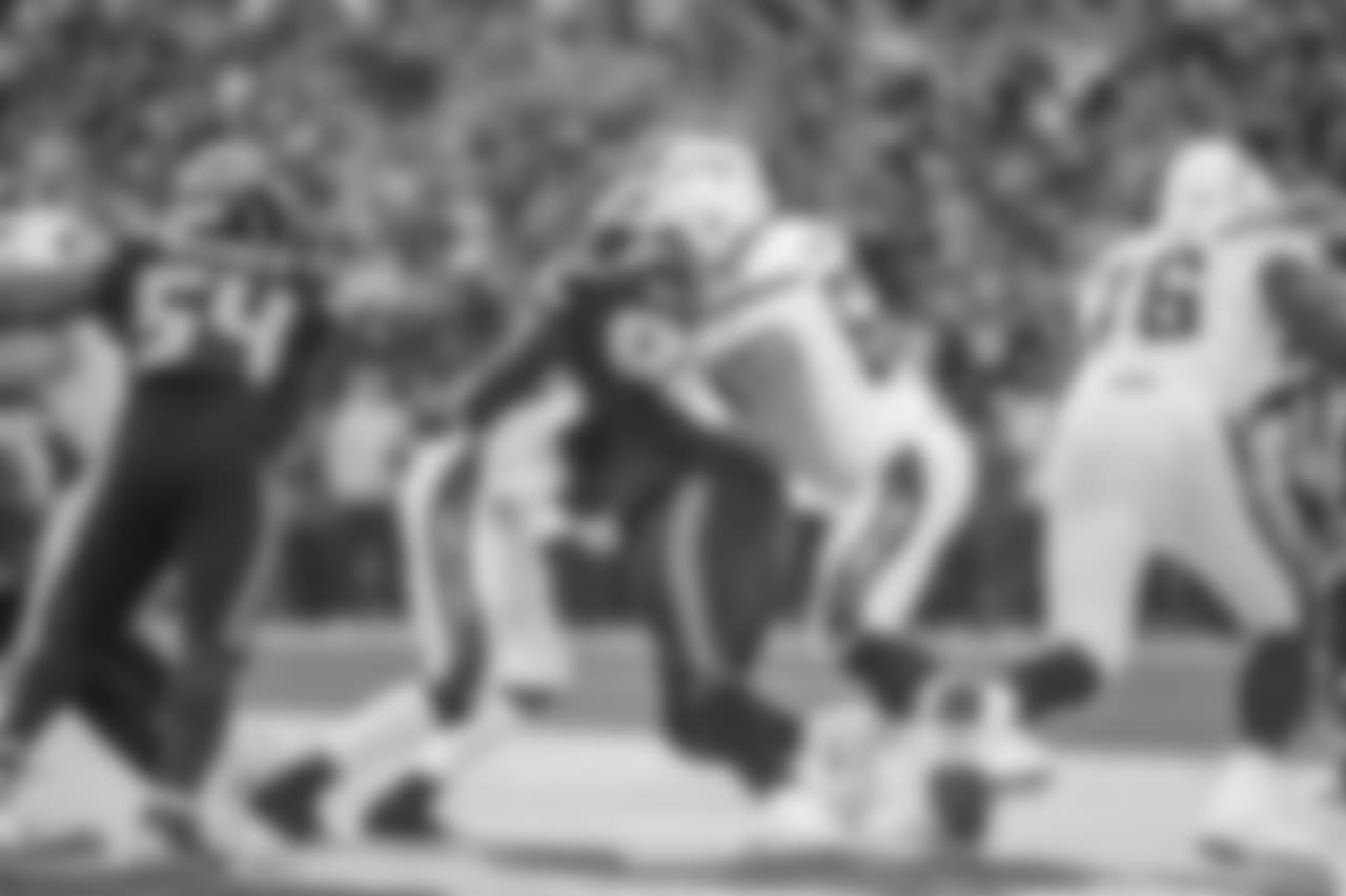 Dan Feeney tackles during the Week 9 contest against the Seattle Seahawks at CenturyLink Field.