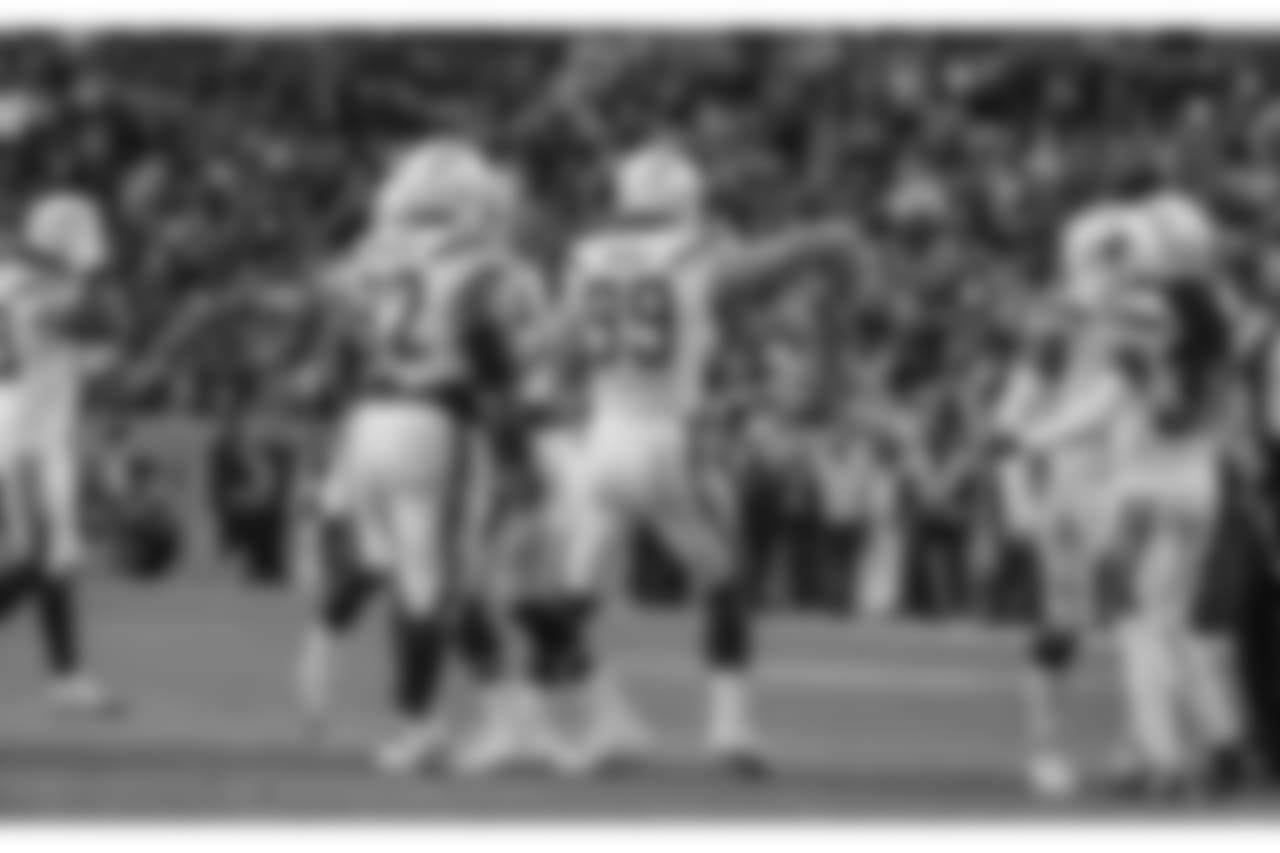 Joey Bosa celebrates recovering a fumbled ball during the Week 17 contest against the Denver Broncos.