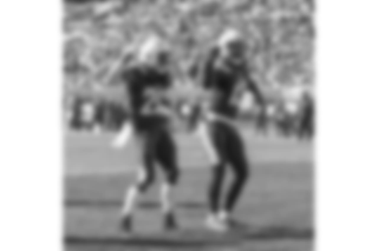 Melvin Gordon and Keenan Allen dance to celebrate Gordon's second touchdown of the game during the Week 6 matchup against the Browns.