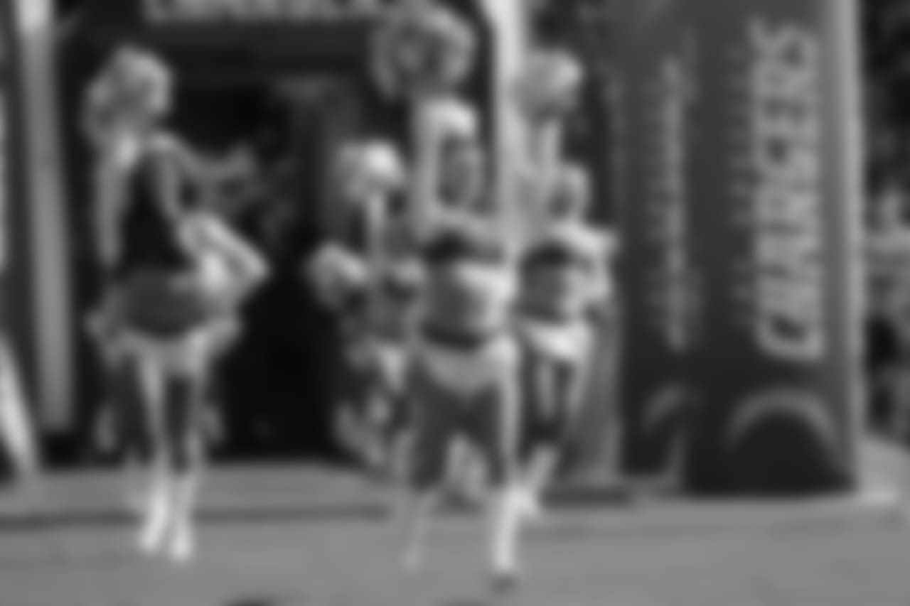 Los Angeles Chargers cheerleaders perform before an NFL preseason football game against the New Orleans Saints Saturday, Aug. 25, 2018, in Carson, Calif. (AP Photo/Marcio Jose Sanchez)