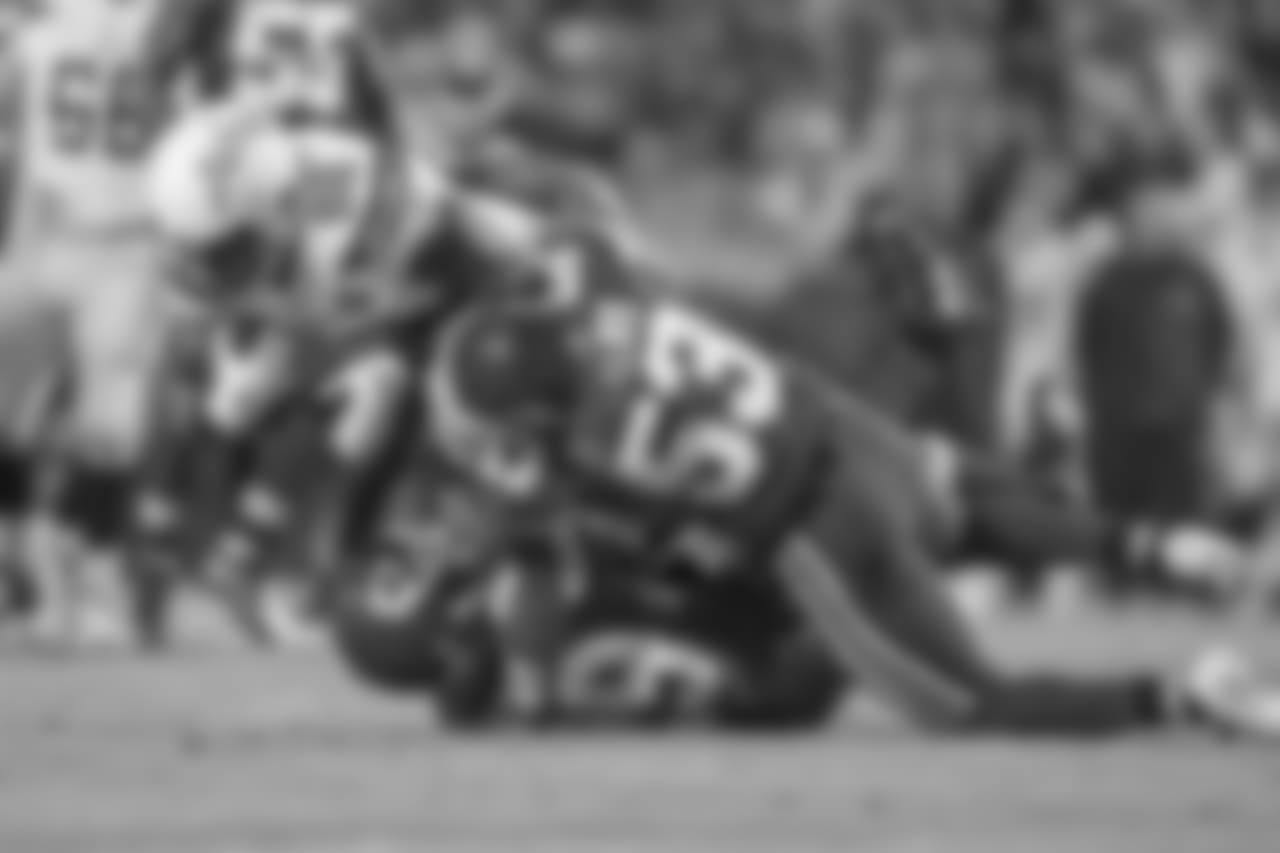Virgil Green is tackled after catching the ball during the Thursday night matchup against the Kansas City Chiefs at Arrowhead Stadium.