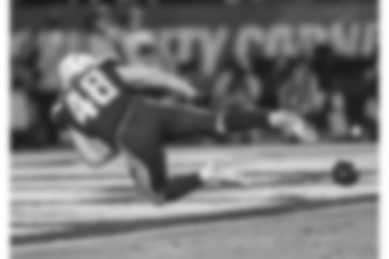 Nick Dzubnar keeps the punt out of the end zone during the Week 16 matchup against the Baltimore Ravens at ROKiT Field at StubHub Center.