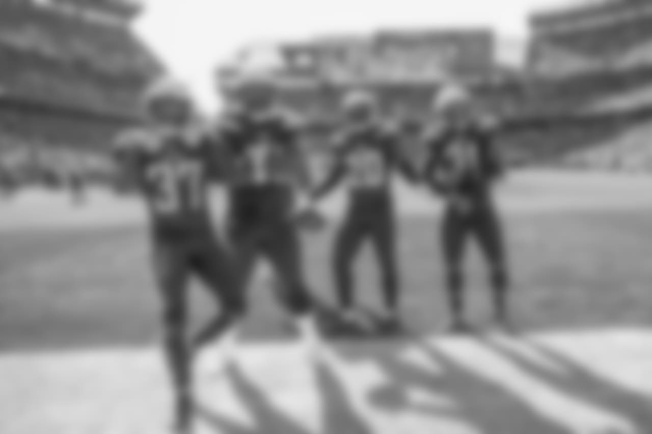 The Bolts pose for a picture after Desmond King's interception during the Week 6 matchup against the Browns.