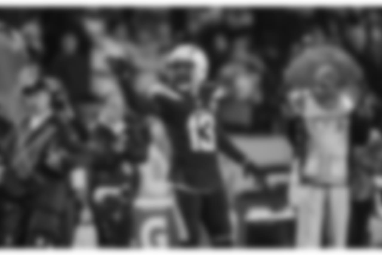 Keenan Allen celebrates catching a pass from Philip Rivers during the Week 16 matchup against the Baltimore Ravens at ROKiT Field at StubHub Center.