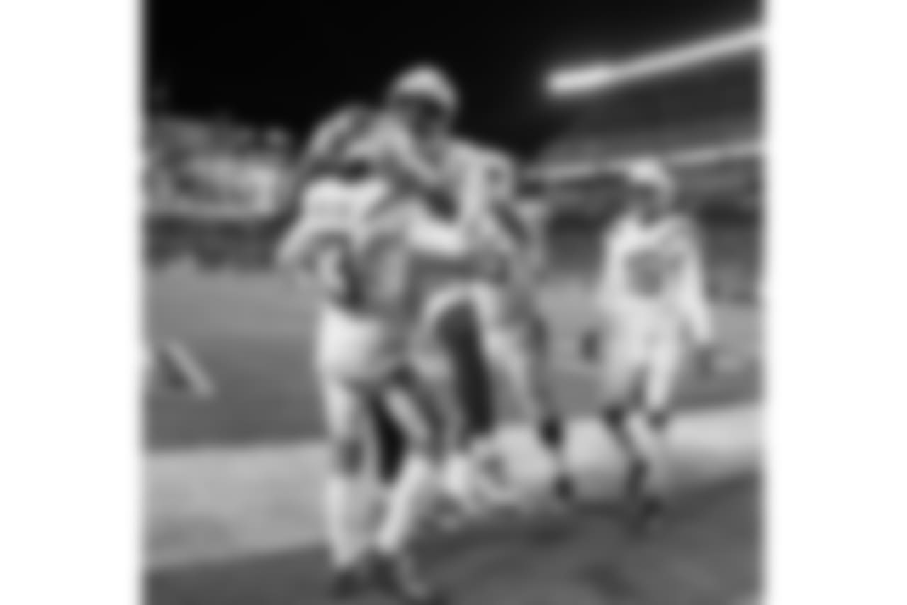 Keenan Allen and Mike Pouncey celebrating during the Week 13 matchup against the Pittsburgh Steelers.