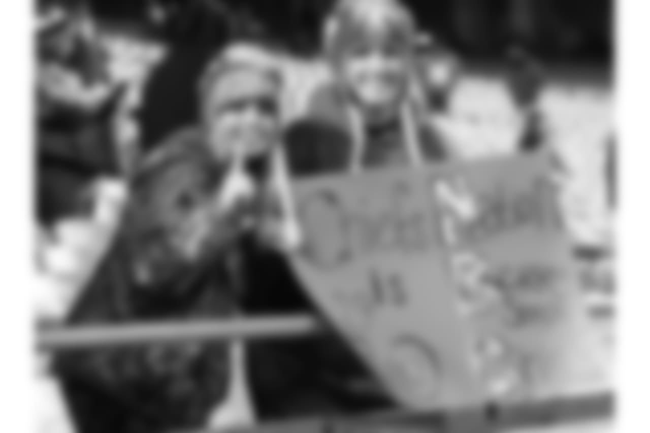 Photos of fans and players showing their support for Safety, Eric Berry