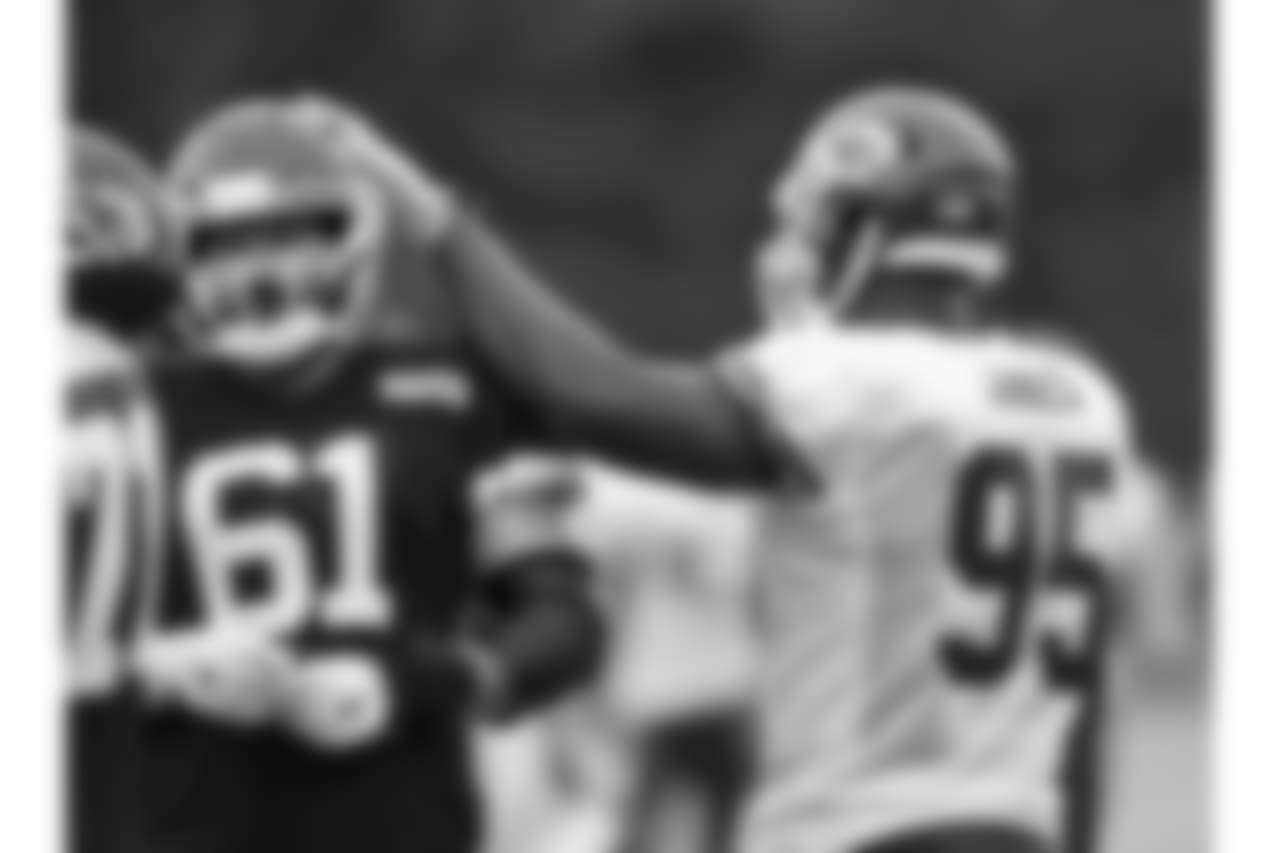 Kansas City Chiefs offensive lineman Mitch Morse (61) and Kansas City Chiefs defensive tackle Chris Jones (95) during practice on 8/6/18 at Chiefs Training Camp at Missouri Western State University in St. Joseph, Missouri.