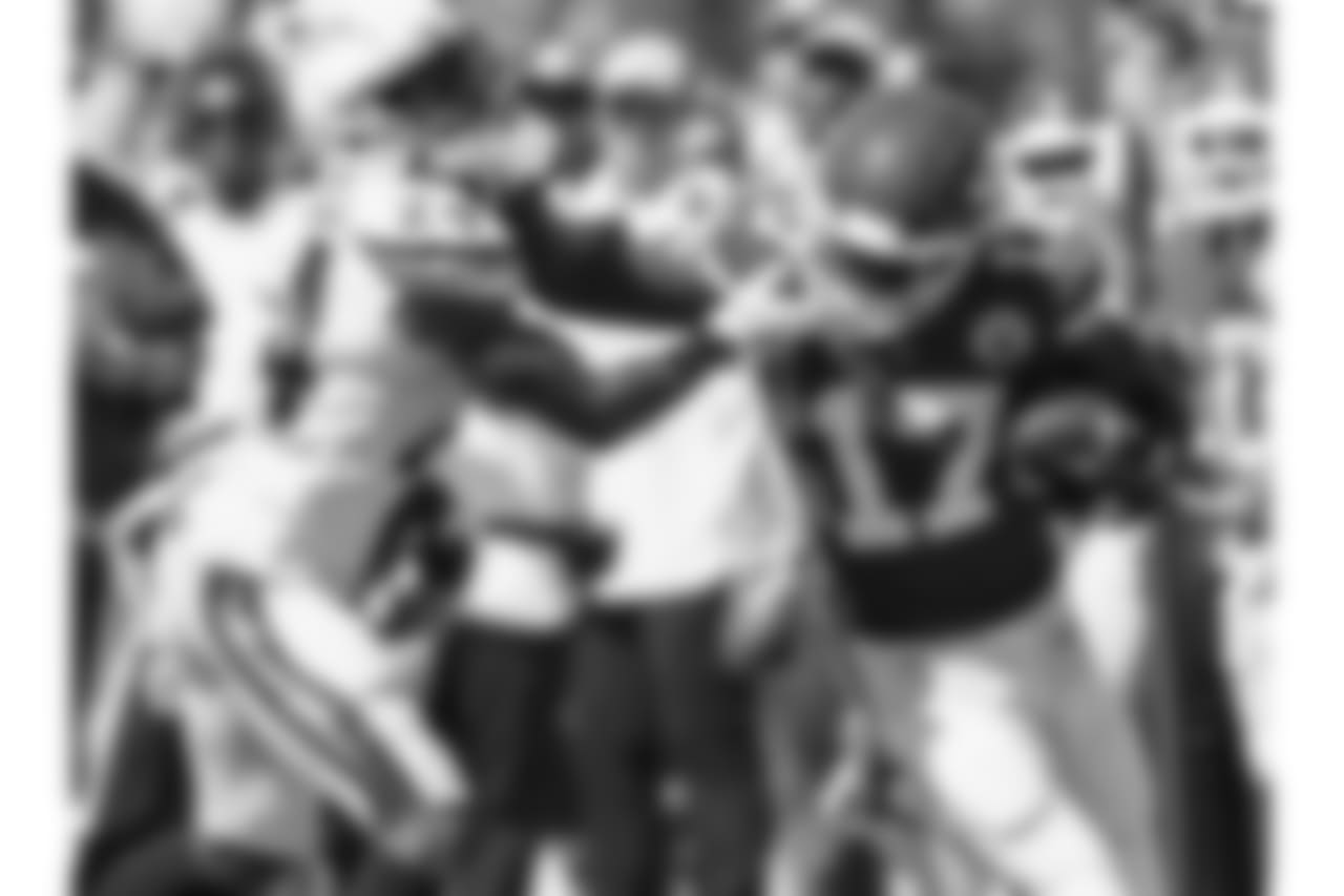 Kansas City Chiefs wide receiver Chris Conley (17) stiff arms a Chargers defensive back