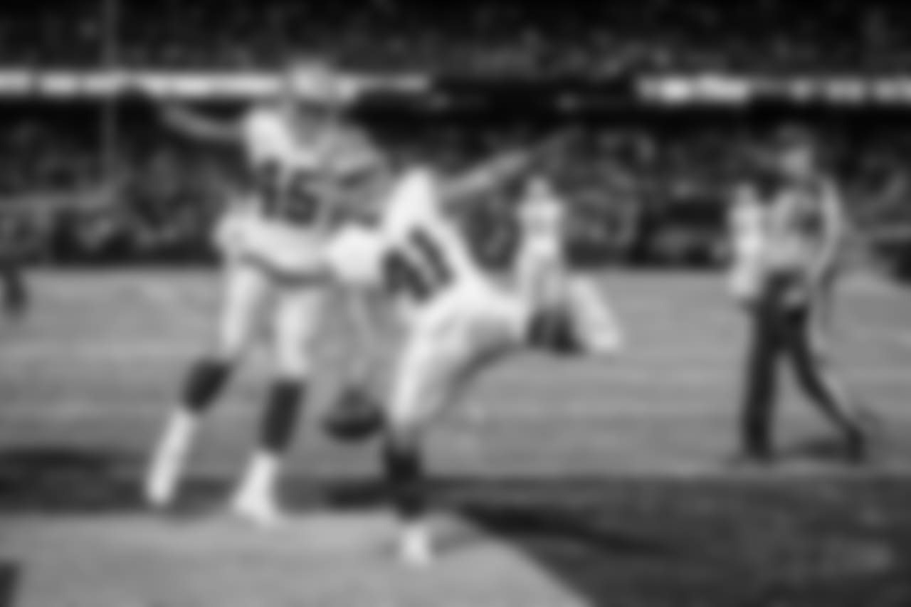 Dallas Cowboys fullback Keith Smith (41) spikes the football after a touchdown run by running back Rod Smith (45) during a 2017 NFL week 15 regular season game against the Oakland Raiders, Sunday, Dec. 17, 2017 in Oakland, Calif. The Cowboys defeated the Raiders, 20-17. (James D. Smith via AP)