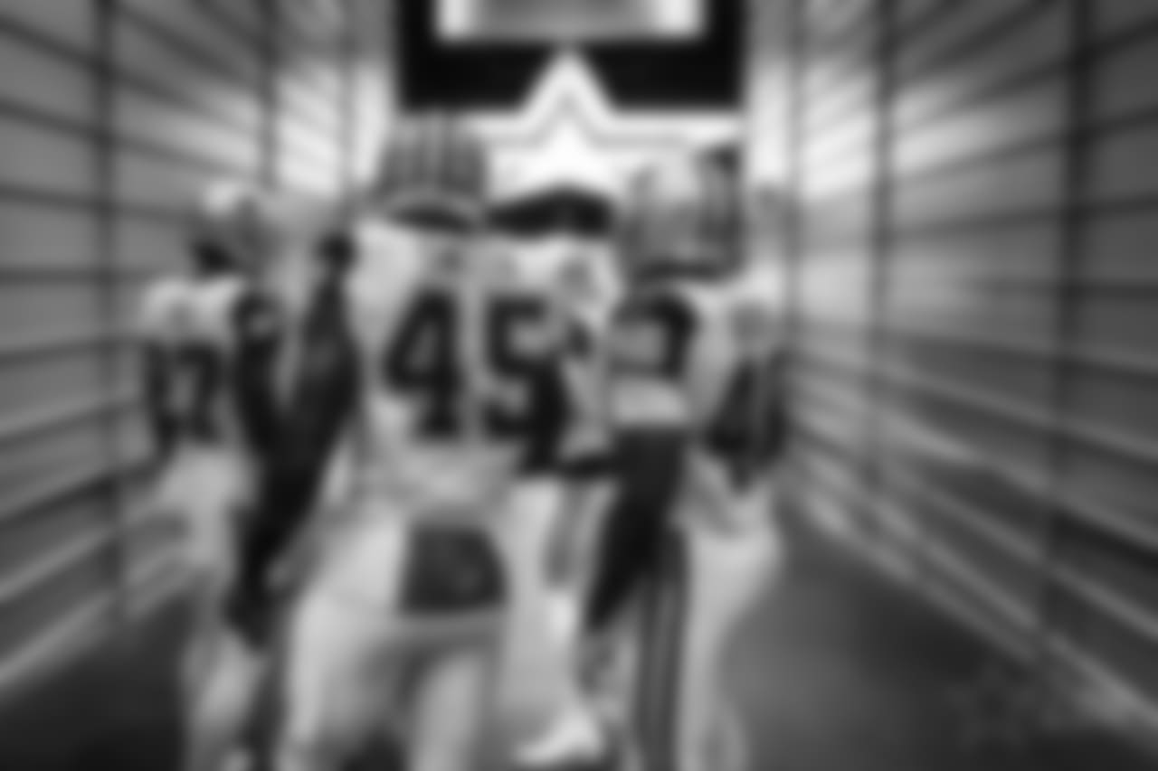 Dallas Cowboys cornerback Jourdan Lewis (27), running back Rod Smith (45) and running back Alfred Morris (46) are seen prior to an NFL football game against the Washington Redskins, Thursday, Nov. 30, 2017, in Arlington, Texas. The Cowboys defeated the Redskins, 38-14. (Ryan Kang via AP)