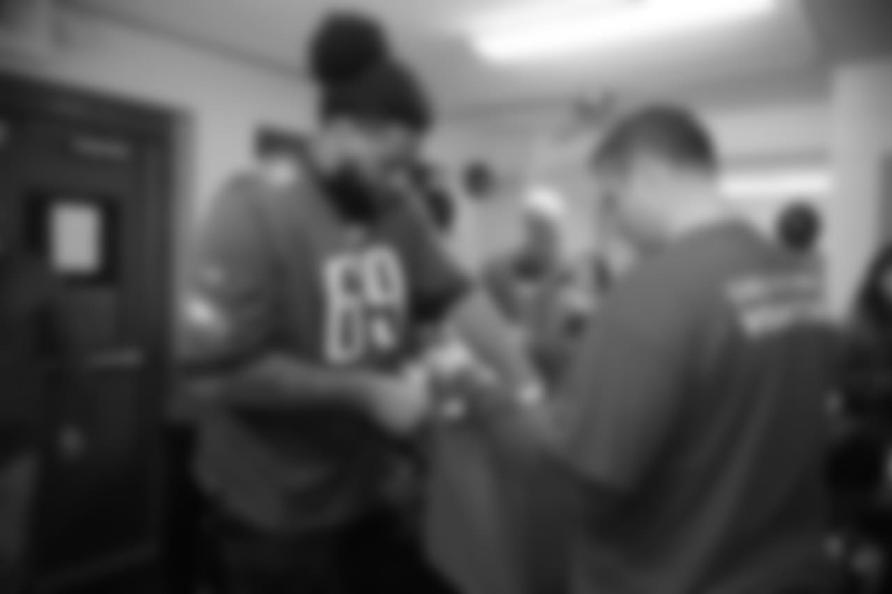 Matt Pryor filling up a bag with food items