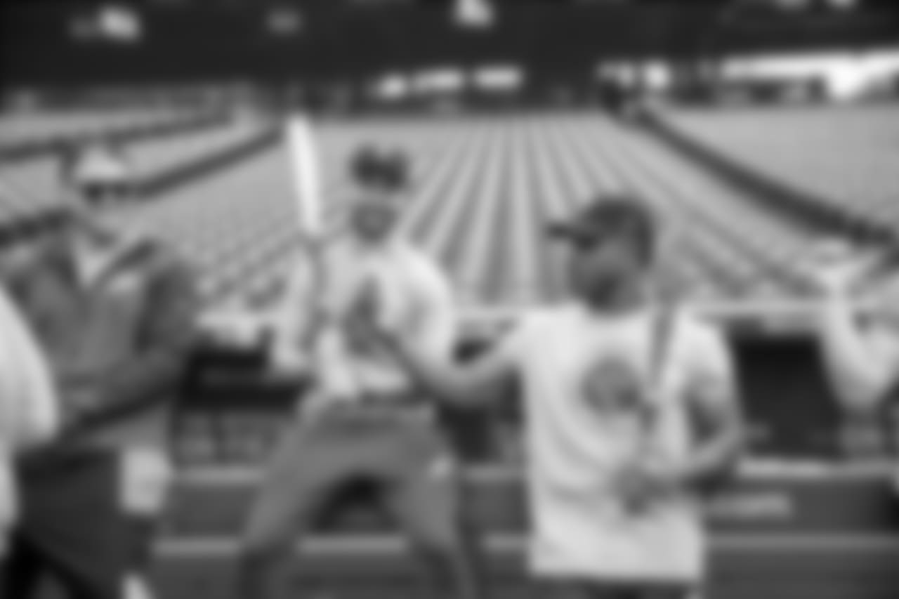Ertz and Elliott watch as Clement talks with fans on Instagram Live