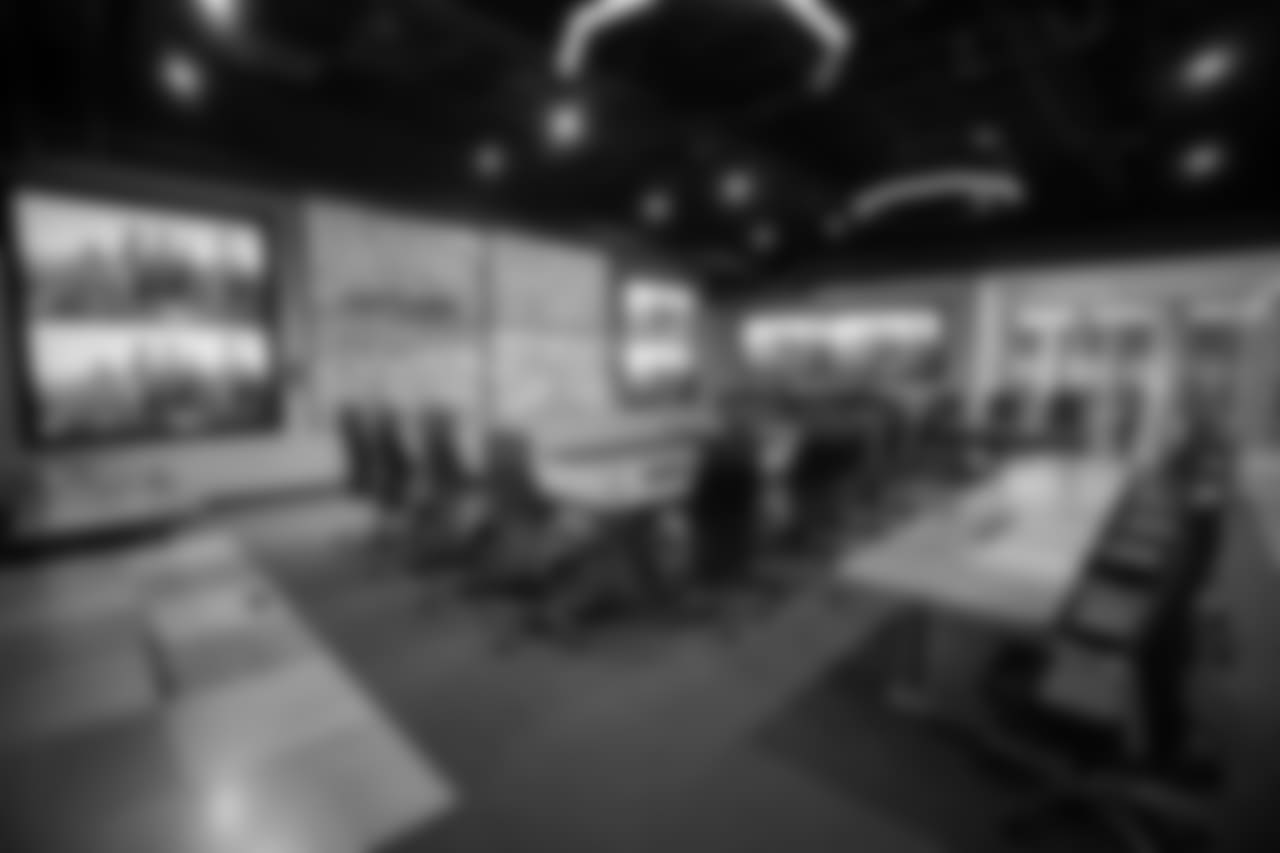 The draft room seats 30 people.