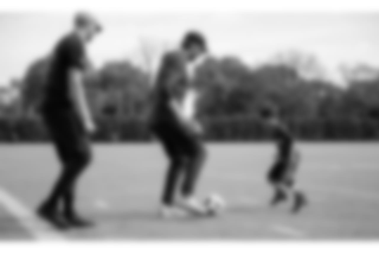 Brandon's favorite sports is soccer, so Foles and Sudfeld kicked a ball around with him