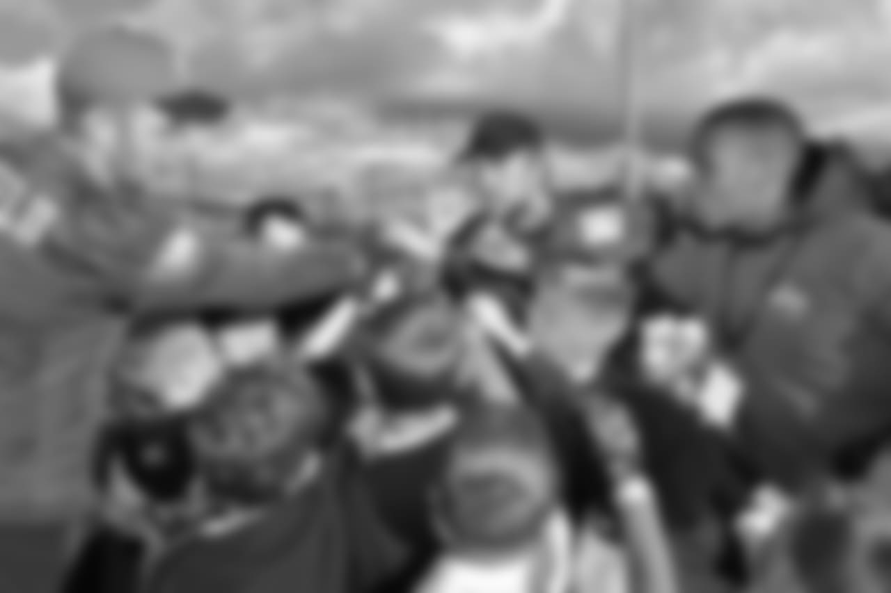QBs Nick Foles and Nate Sudfeld were among the Eagles players that ran drills with children after practice