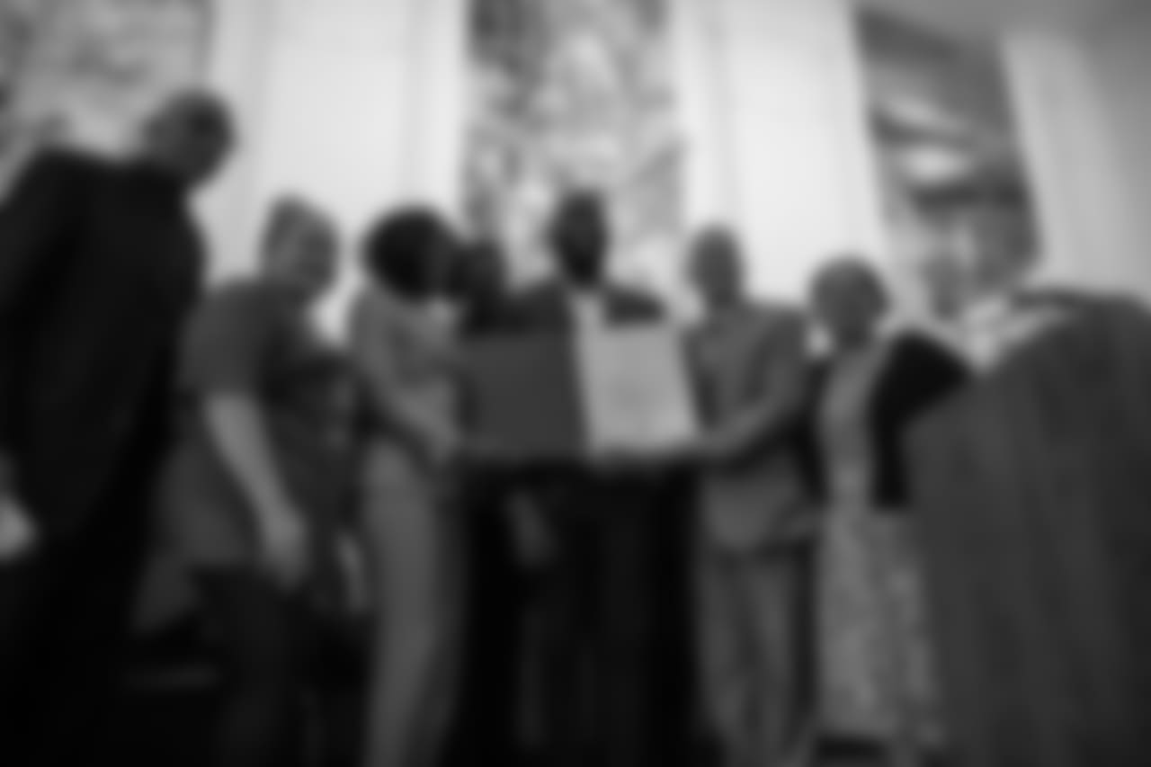 Malcolm Jenkins and his mother with members of the Camden City Council and Pastor John O. Parker (far left)