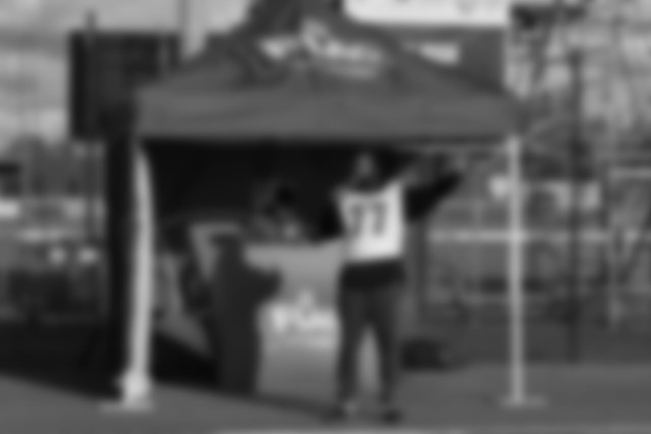 DE Michael Bennett playing the role of hype man
