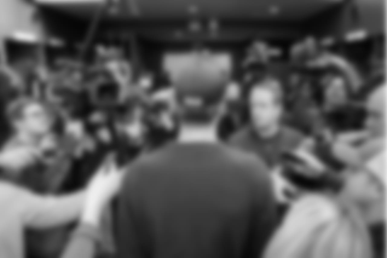 QB Nick Foles surrounded by media