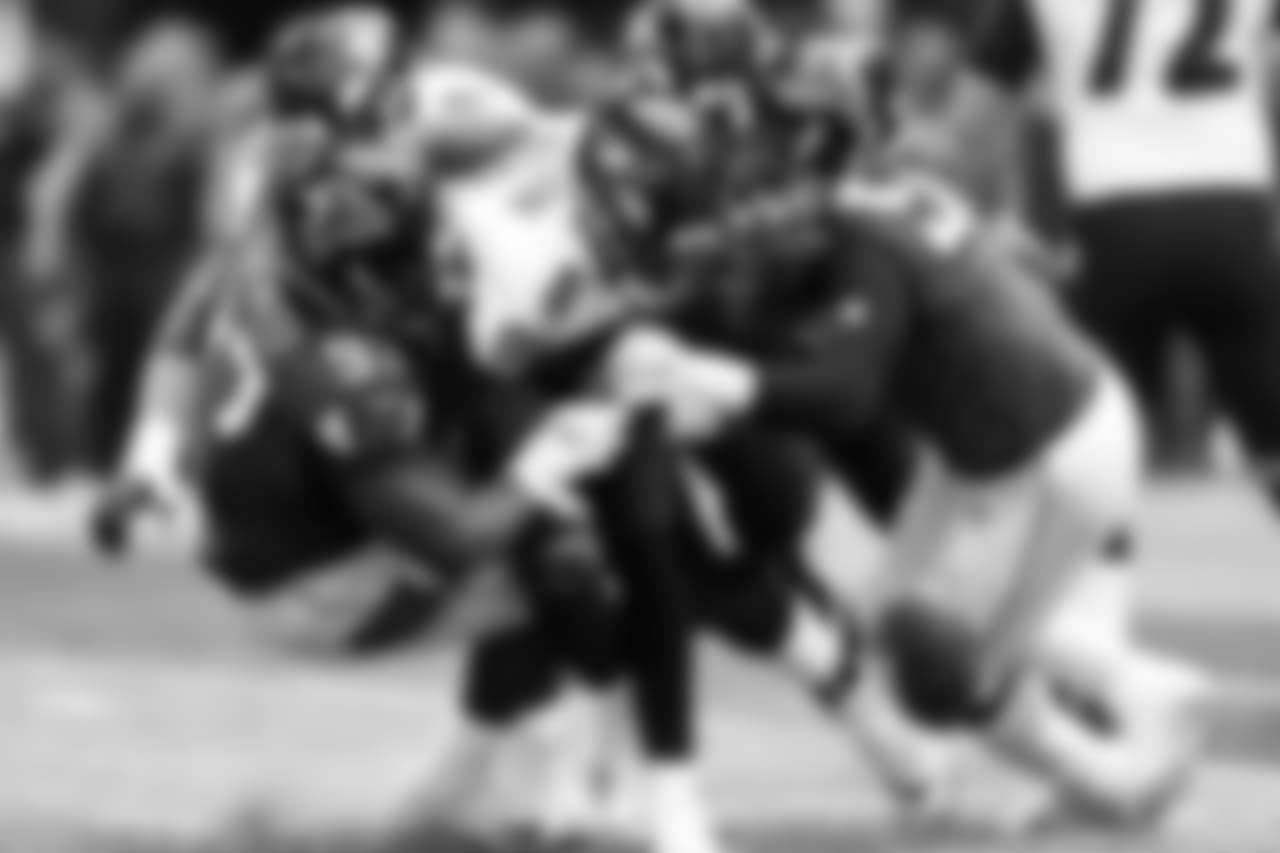 DT Grady Jarrett, DE Takk McKinley force Lamar Jackson to fumble