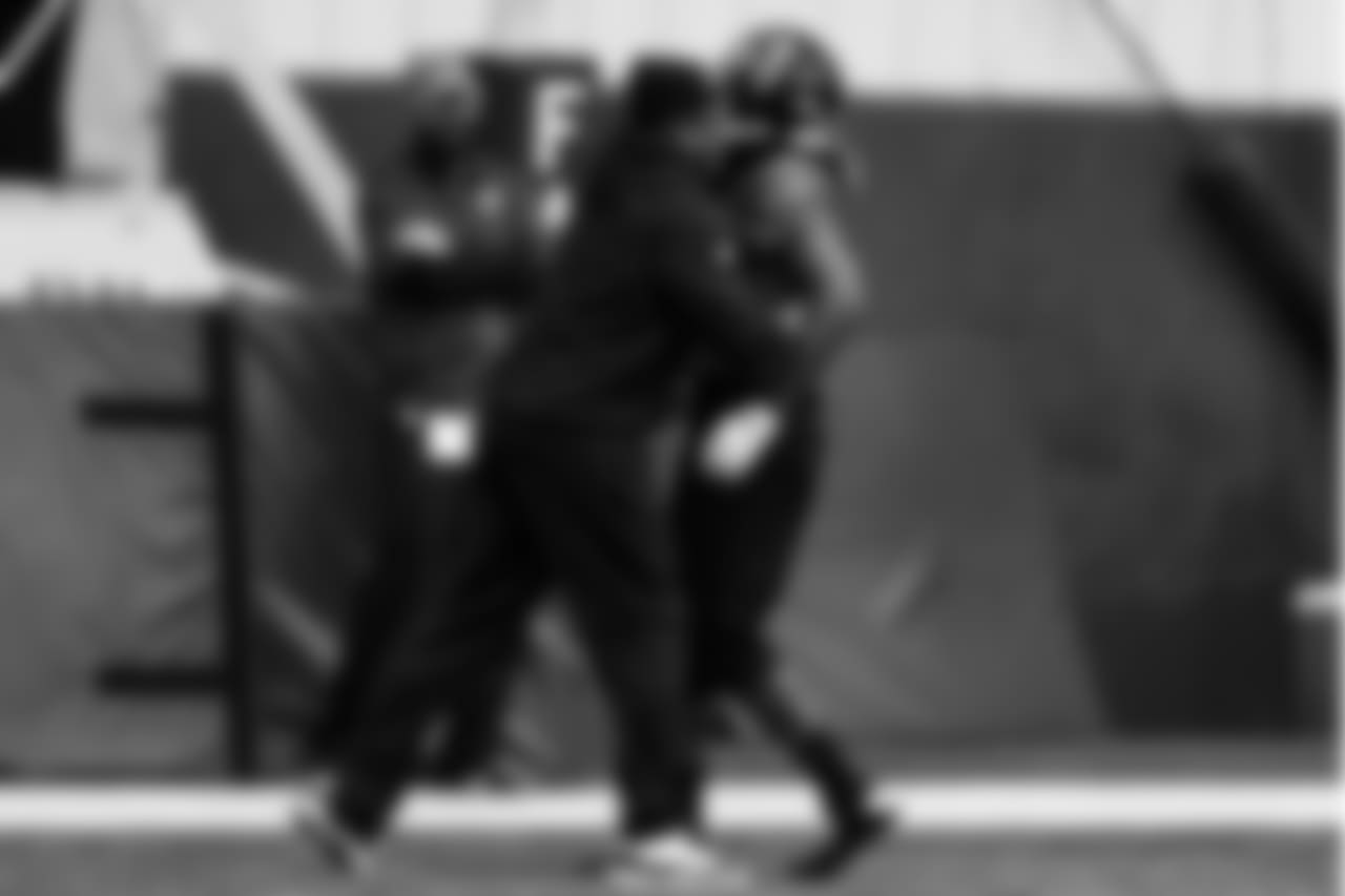 WR Justin Hardy, asst. head coach / wide receivers coach / passing game coordinator, Raheem Morris