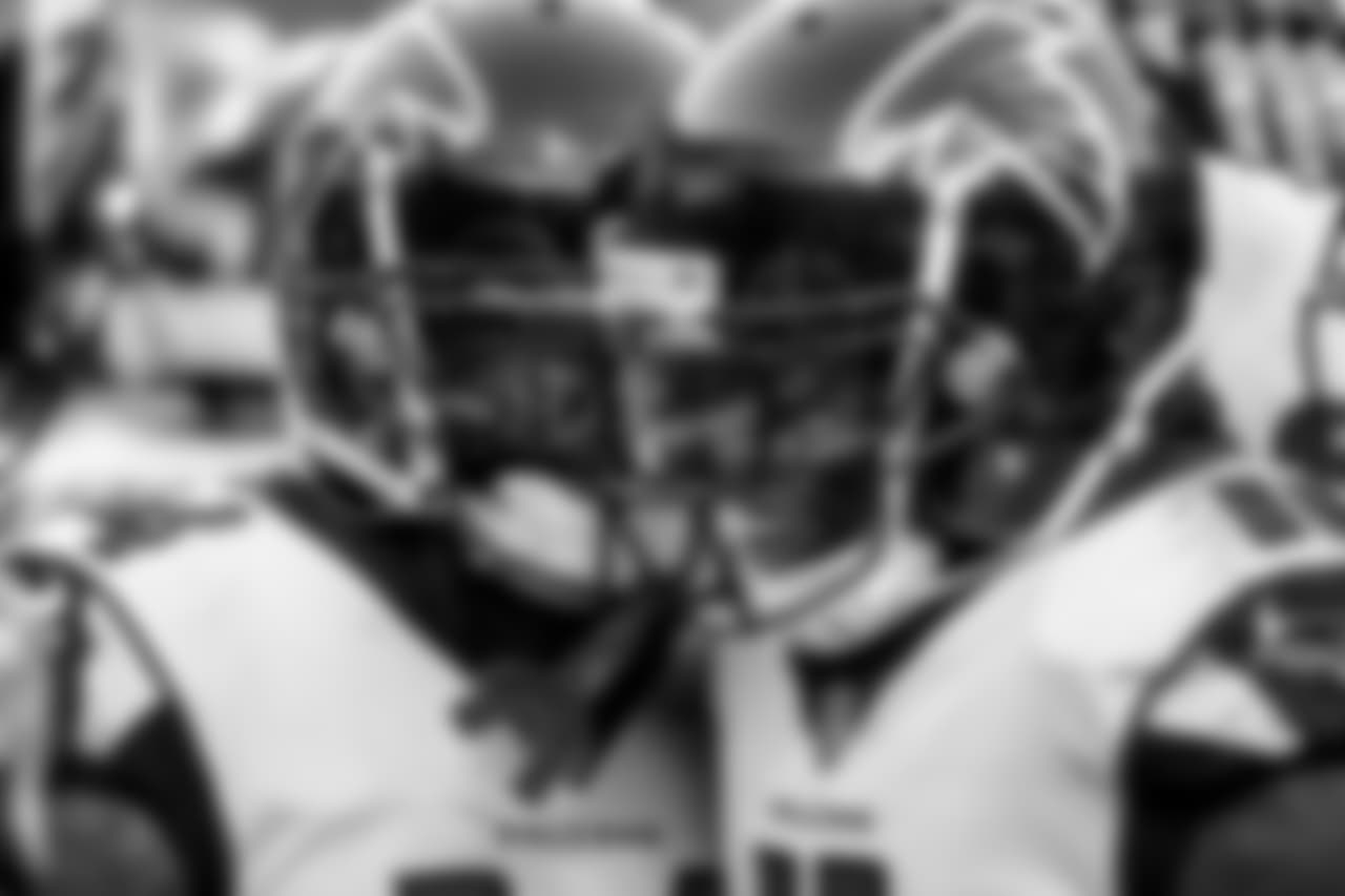 WR Julio Jones is surrounded by teammates after scoring his first touchdown of 2018.