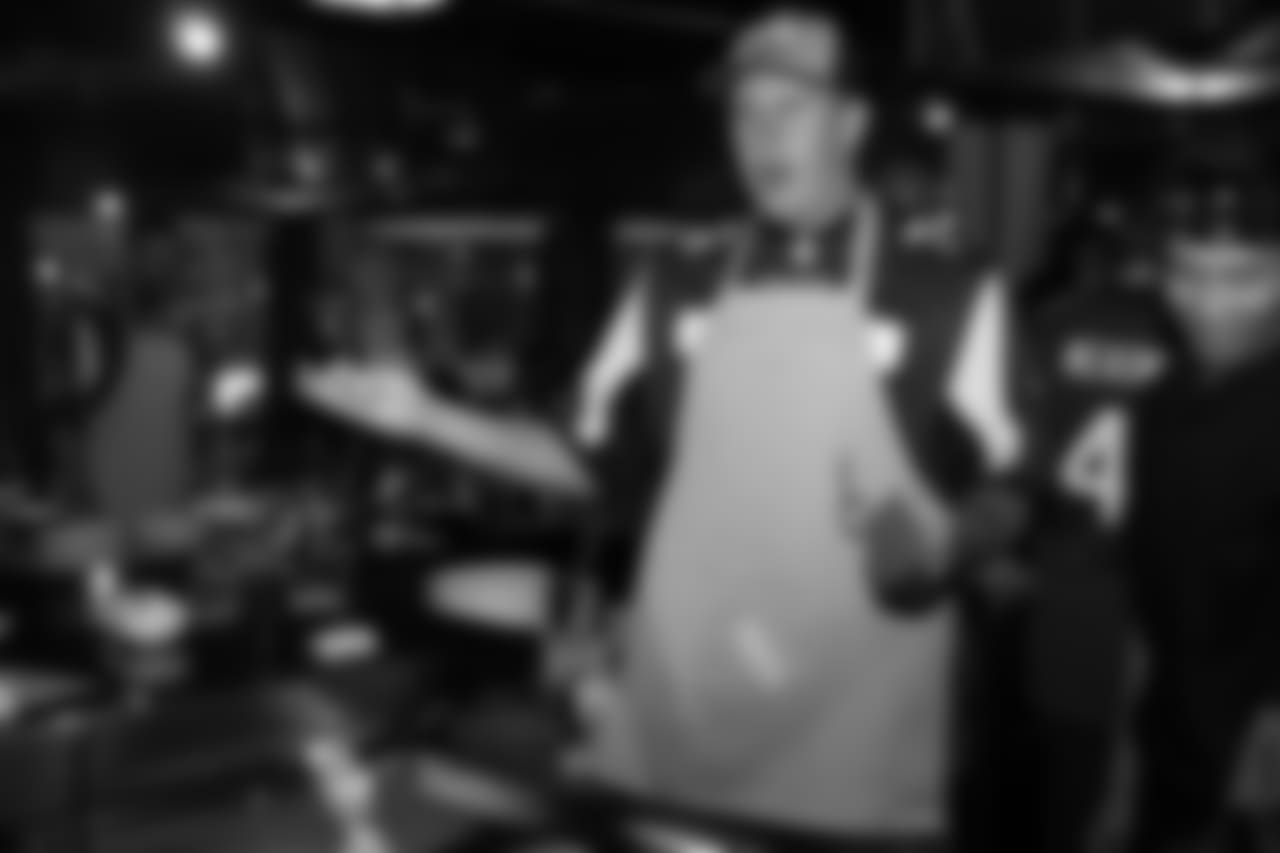 T Daniel Brunskill cooking at the dazzle and dine event