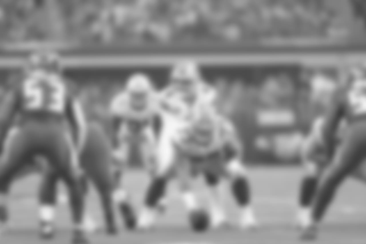 Dallas Cowboys center Joe Looney (73) waits to snap the ball to quarterback Dak Prescott (4) during a 2018 NFL week 16 regular season game against the Tampa Bay Buccaneers, Sunday, Dec. 23, 2018 in Arlington, Texas. The Cowboys defeated the Buccaneers, 27-20. (James D. Smith via AP)