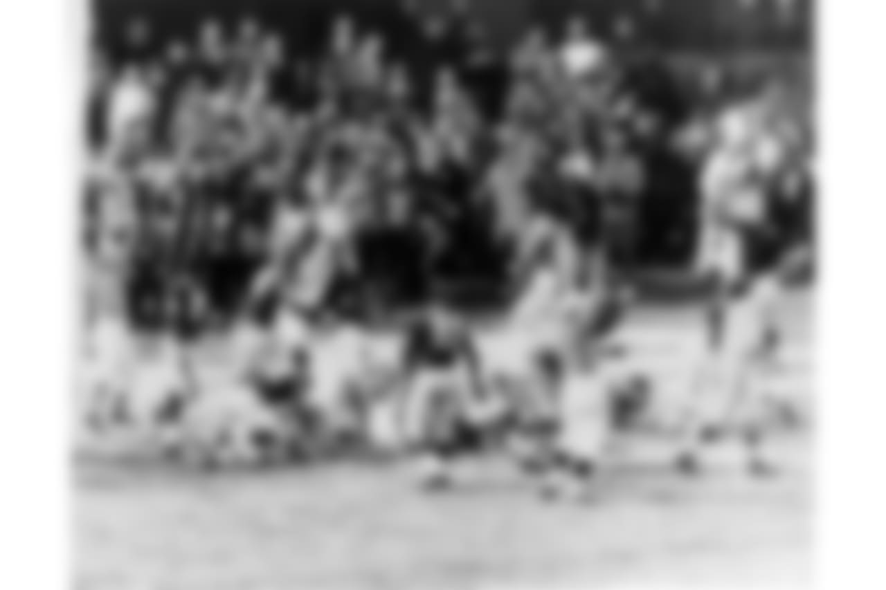Baltimore Colts fullback Alan Ameche scores the winning touchdown in a 23 to 17 Baltimore Colts overtime win over the New York Giants in the 1958 NFL Championship game played at Yankee Stadium on Dec. 28, 1958 in Bronx, New York. (AP Photo/NFL Photos)
