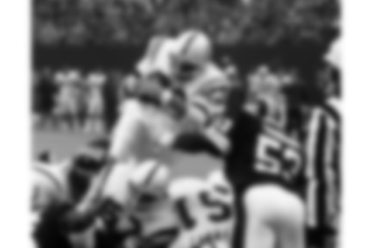 Running back Don McCauley (23) of the Baltimore Colts dives for a gain against the New York Giants in 1979. (AP Photo / Al Messerschmidt)