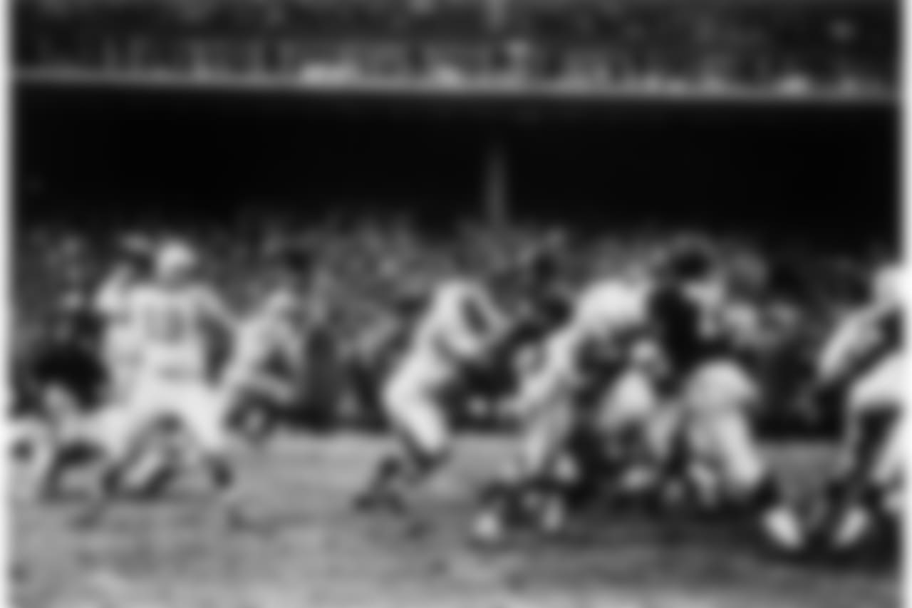 Baltimore Colts Hall of Fame quarterback Johhny Unitas (19) throws upfield in a 23 to 17 Baltimore Colts overtime win over the New York Giants in the 1958 NFL Championship game played at Yankee Stadium on Dec. 28, 1958 in Bronx, New York. (AP Photo/NFL Photos)