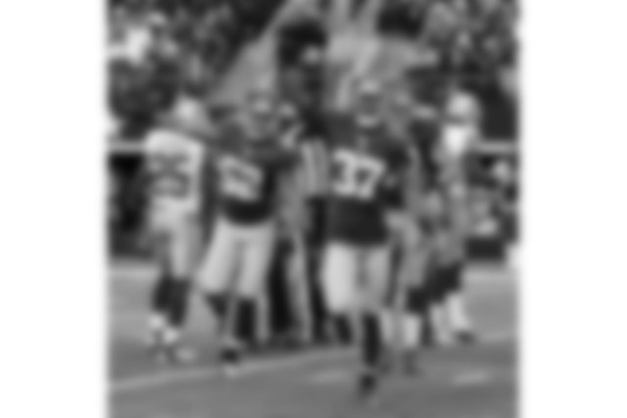 New York Giants cornerback Michael Coe (37) celebrates his fumble recovery against the Dallas Cowboys during the first half of an NFL football game Sunday, Oct. 28, 2012 in Arlington, Texas. (AP Photo/Tony Gutierrez)