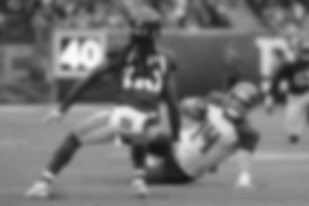 Tampa Bay Buccaneers quarterback Ryan Fitzpatrick slide down during the first half of an NFL football game against the New York Giants, Sunday, Nov. 18, 2018, in East Rutherford, N.J. (AP Photo/Julio Cortez)