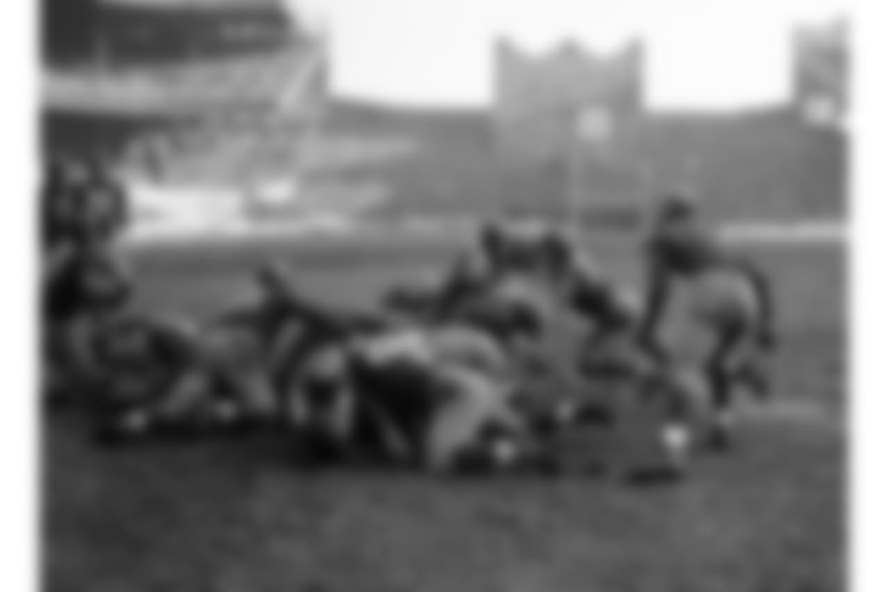 New York Giants fullback John Karcis plunges to score from the one foot line against the Washington Redskins at the Polo Grounds in New York City, Dec. 4, 1938. A crowd of 57,461 saw the Giants win, 36-0, to take the Eastern Division title. (AP Photo)
