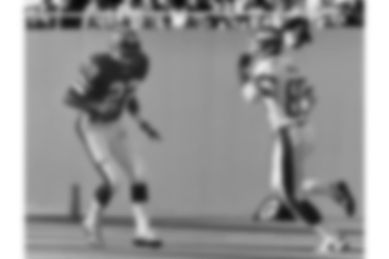 Buffalo Bills safety Steve Freeman (22) drops back in pass coverage on New York Jets wide receiver Wesley Walker (85) during an NFL game at East Rutherford, N.J., Oct. 5, 1986. The Jets defeated the Bills 14-13. (AP Photo/NFL Photos)