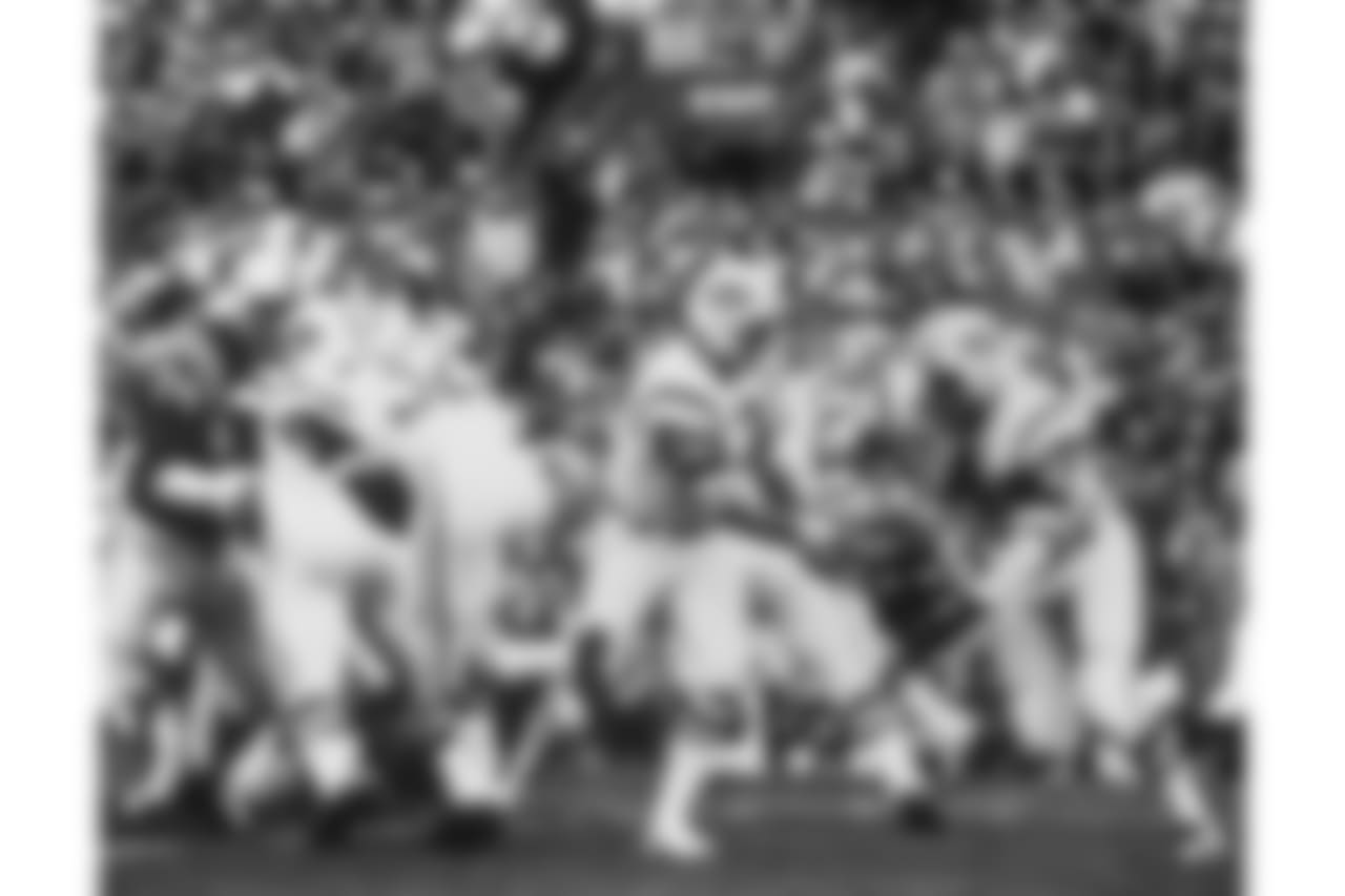 New York Jets quarterback Joe Namath, (12), hands off the football to Matt Snell, (41), during Super Bowl III in Miami, Fla., on Jan. 12, 1969. The Jets beat the Baltimore Colts 16-7. (AP Photo)