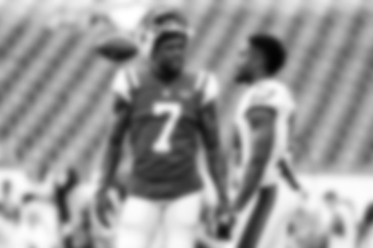 New York Jets' Tre McBride, left, and Philadelphia Eagles' Rashard Davis meet before a preseason NFL football game, Thursday, Aug. 30, 2018, in Philadelphia. (AP Photo/Michael Perez)