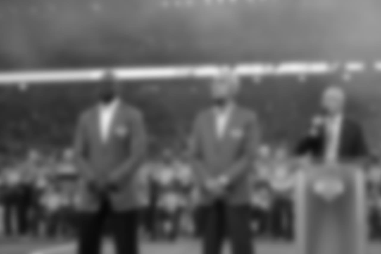Herman Moore and Roger Brown during the Pride of the Lions induction ceremony during halftime of a NFL football game against the Seattle Seahawks on Sunday, Oct. 28, 2018 in Detroit. (Detroit Lions via AP).