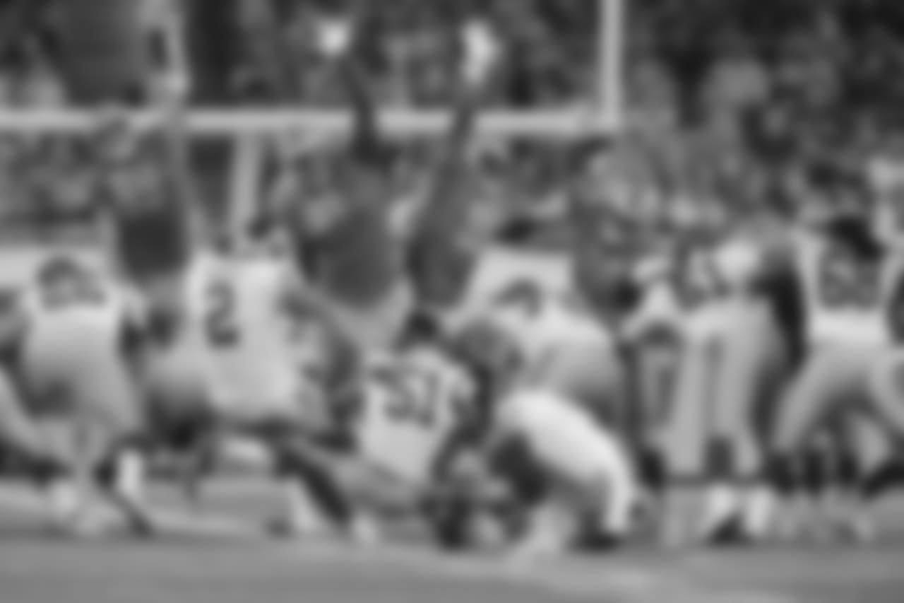 Detroit Lions defensive linemen Anthony Zettel (69), A'Shawn Robinson (91), Cornelius Washington (90) and Jeremiah Ledbetter (98) jump to block a field goal during a NFL football game against the New York Giants on Friday, Aug. 17, 2018 in Detroit. (Detroit Lions via AP).