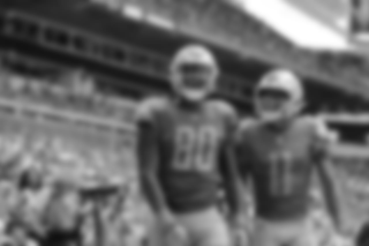 Detroit Lions tight end Michael Roberts (80) and Detroit Lions wide receiver Marvin Jones Jr. (11) celebrate a touchdown during a NFL football game against the Miami Dolphins on Sunday, Oct. 21, 2018 in Miami Gardens, Fla. (Detroit Lions via AP).