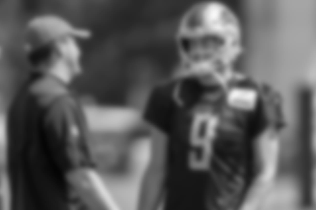 Detroit Lions quarterback Matthew Stafford (9) talks with offensive coordinator Jim Bob Cooter during training camp practice on Monday, Aug. 13, 2018 in Allen Park, Mich. (Detroit Lions via AP)
