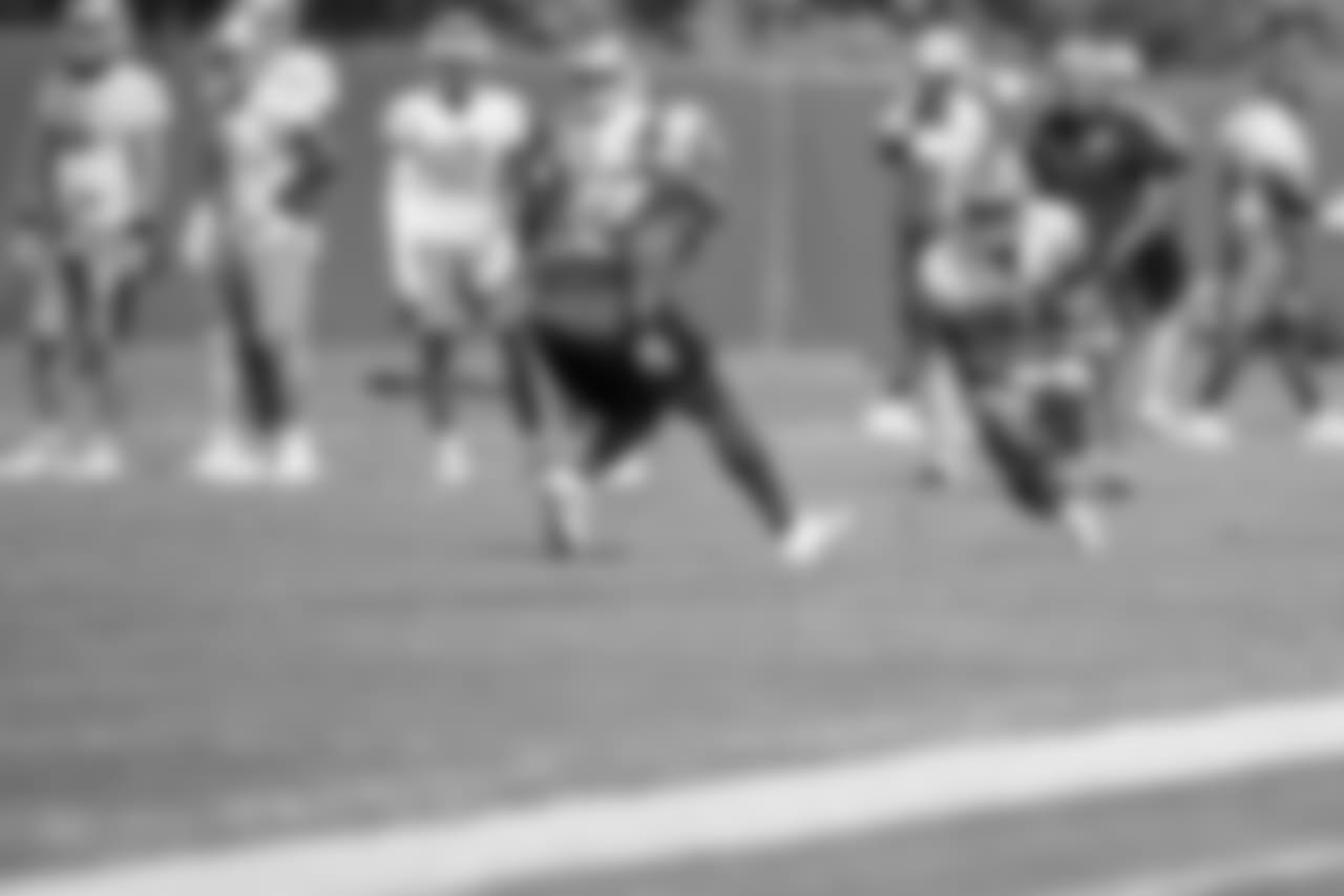 Detroit Lions running back Kerryon Johnson (33) catches a pass during training camp practice on Monday, Aug. 13, 2018 in Allen Park, Mich. (Detroit Lions via AP)