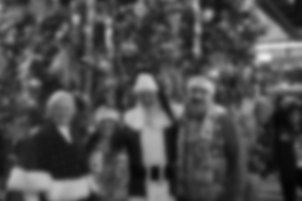 Mrs. Claus and Santa Claus before a NFL football game against the Minnesota Vikings on Sunday, Dec. 23, 2018 in Detroit. (Detroit Lions via AP).